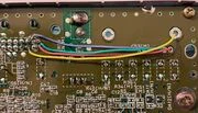 Fig. 5. A completed RGB install using SMD resistors. Note that 82 ohm resistors were used in this particular mod to help bring down the brightness that 1CHIP consoles are known for.